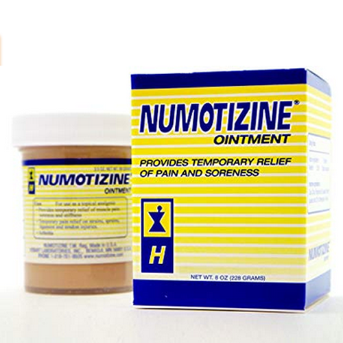 Large box of Numotizine ointment with product in container behind it